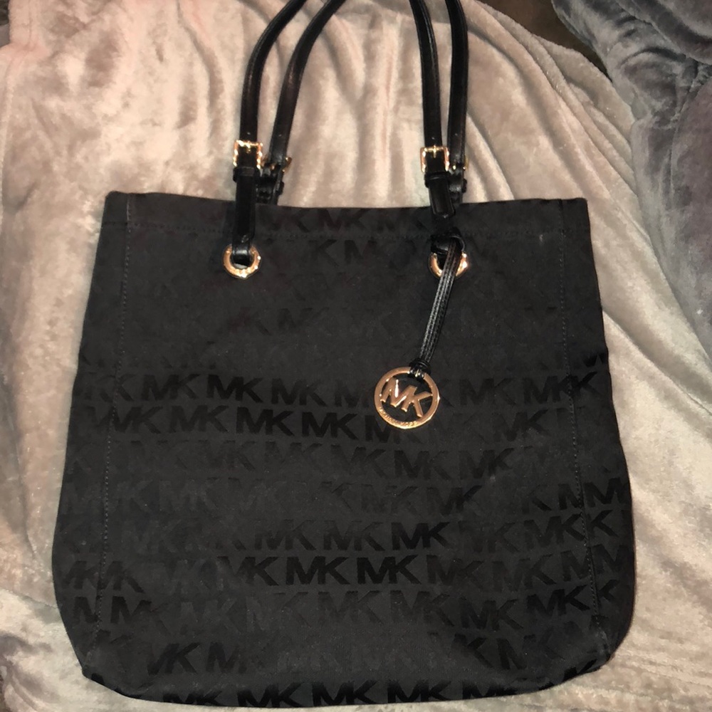 Micheal Kors black monogrammed tote bag